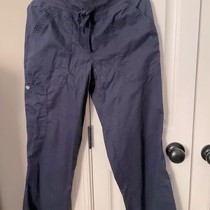 Pair of koi navy blue scrubs. Used but in good condition.Small petite pants.